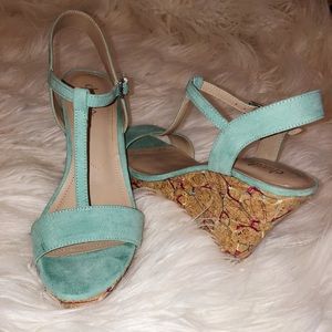 Colorfully embroidered mint green wedges